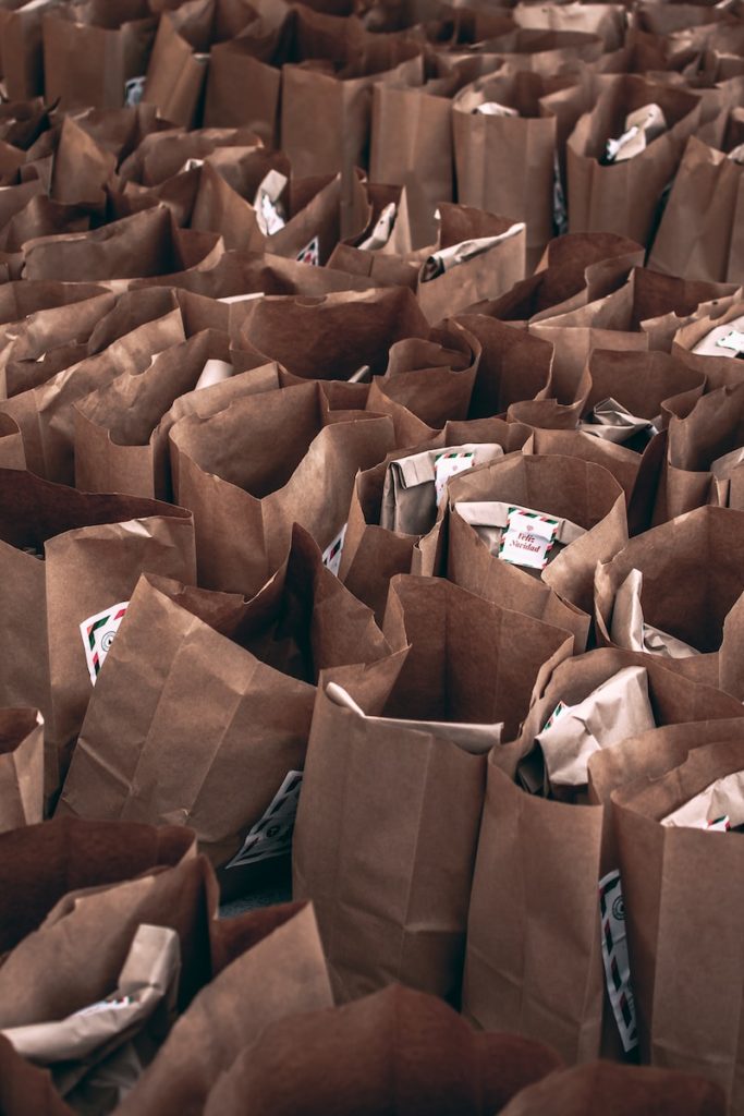 a large amount of brown paper bags